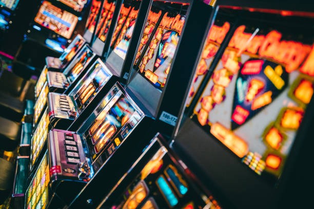 Roulette wheel and card shoe on live-dealer table broadcast